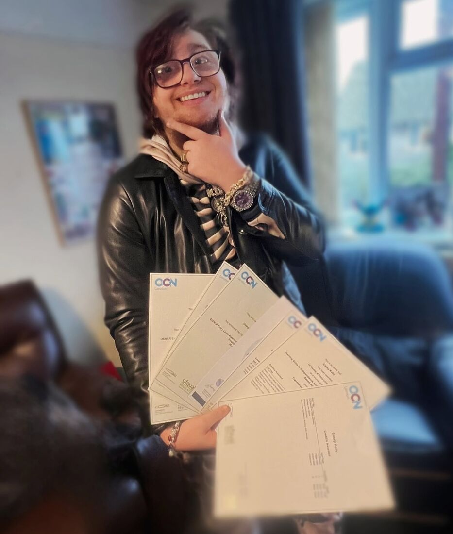 Showing off a stack of newly earned certificates
